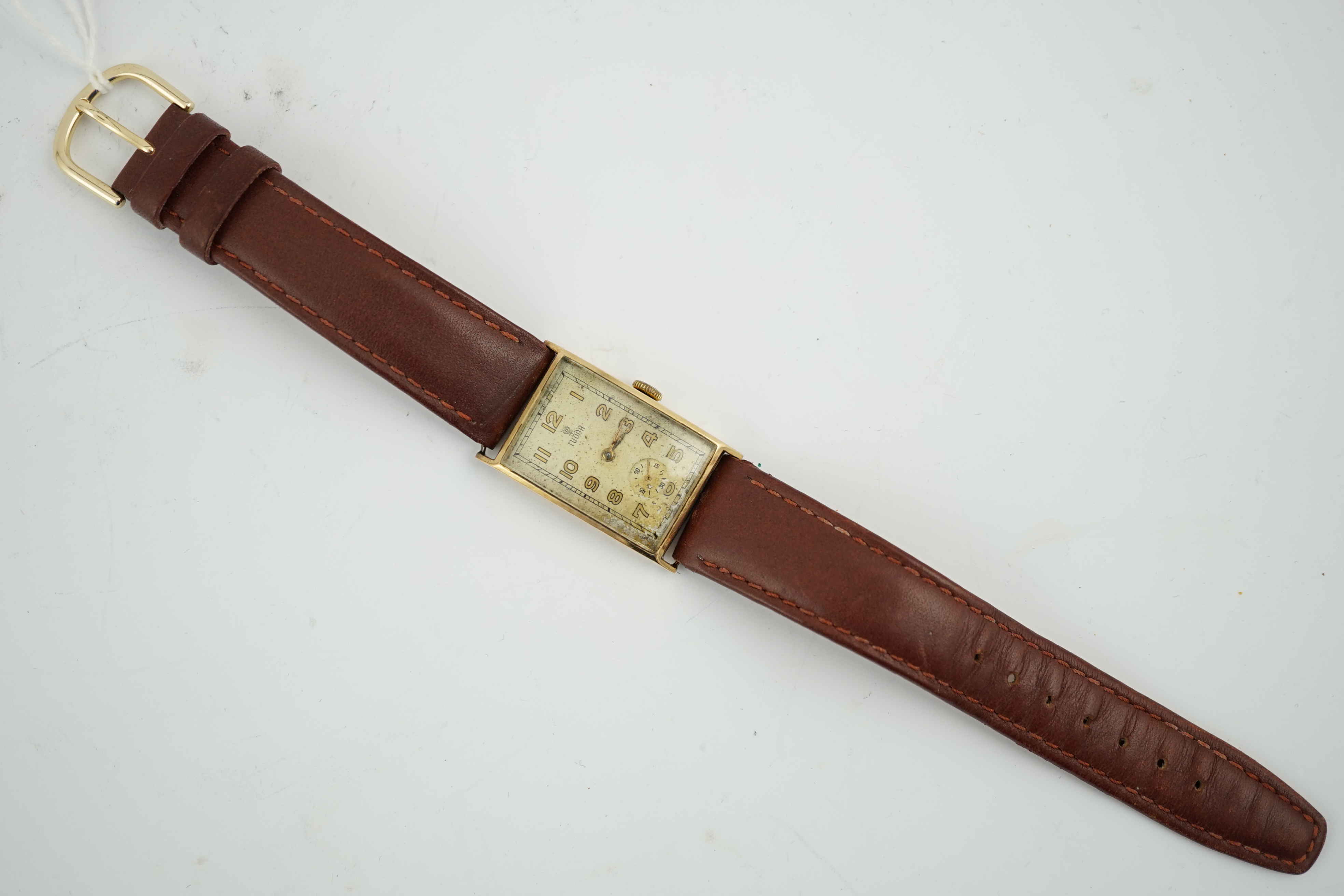 A gentleman's 1950's? 14k gold Tudor manual wind rectangular dial wrist watch